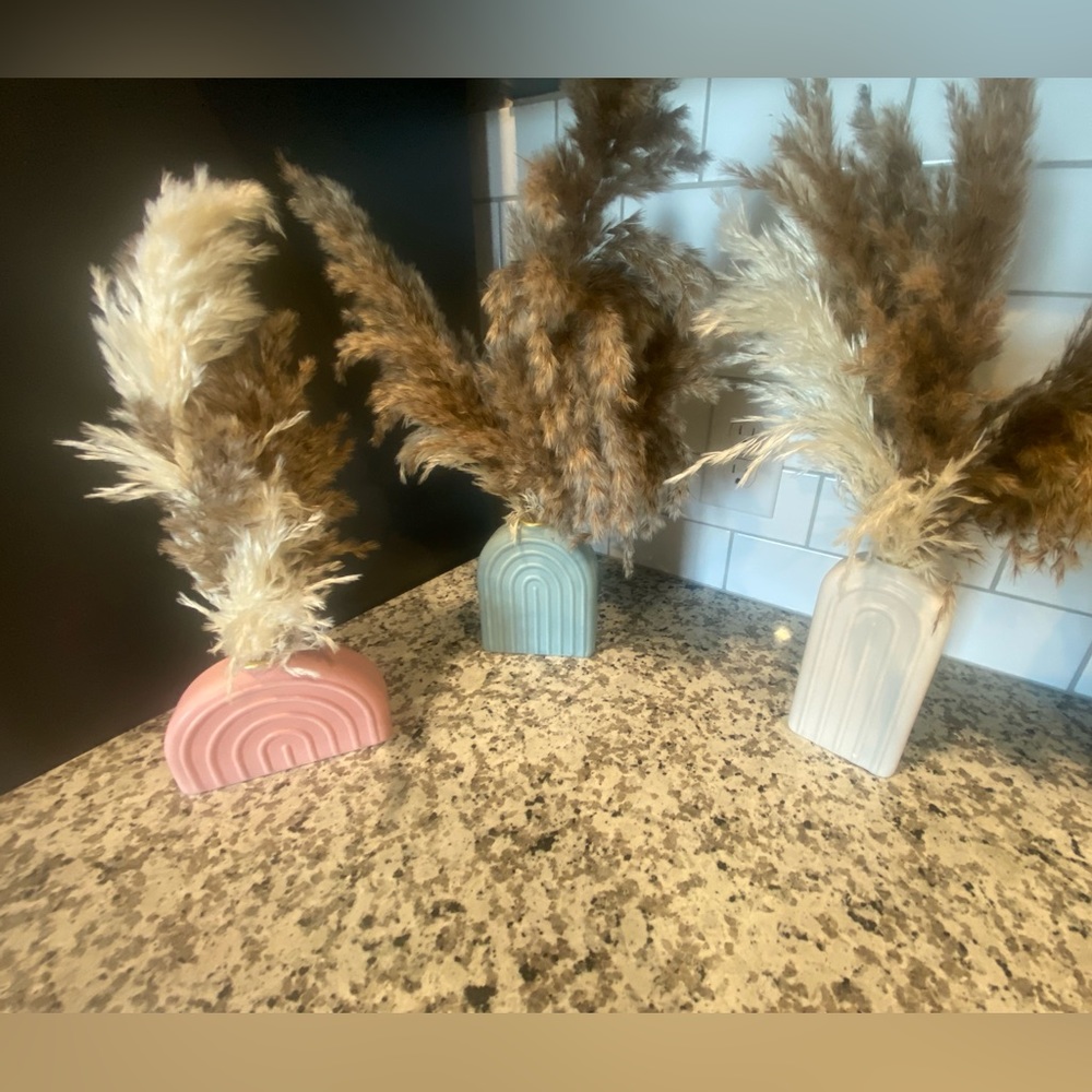 PINK BLUE AND WHITE CUTE DECOR PIECES WITH FAKE PLANTS WITH IT